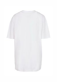 Hvid bomulds T-shirt med løs pasform, korte ærmer og rund halsudskæring. Ingen synlige logoer eller mønstre på bagsiden.