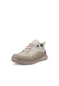 Scarpa sportiva beige con tomaia in rete, suola in gomma e accenti testurizzati. Presenta lacci rosa e un gancio per garantire la vestibilità.