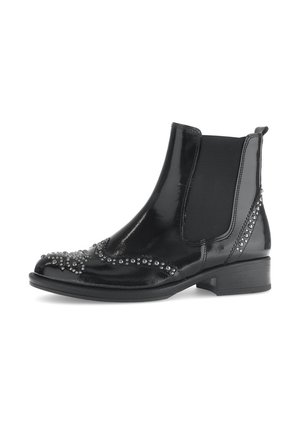 Black patent leather Chelsea boots with elastic sides, embellished with silver studs along the toe and heel. Low stacked heel for support.
