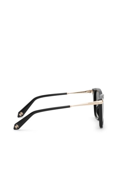 Lunettes de soleil rectangulaires noires et dorées avec de fines branches dorées et des embouts noirs ornés d’un petit logo doré.