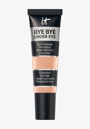 Tube van IT Bye Bye Under Eye, een concealer met volledige dekking, anti-veroudering en waterbestendig, met zwarte dop en beige product zichtbaar in het middelste deel.