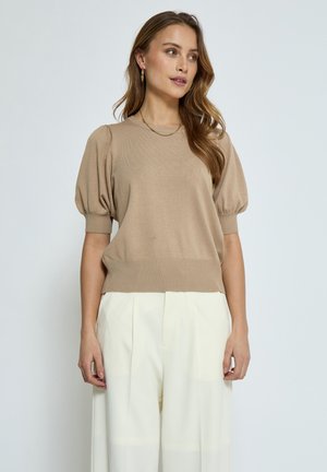 Beige knitted sweater with short puffed sleeves, ribbed neckline, and hem, paired with cream trousers. Soft texture and relaxed fit.