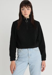 Urban Classics LADIES SHORT SHERPA TROYER - Flisinis džemperis - black
