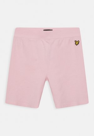 Calções cor-de-rosa claros feitos de algodão macio, apresentando uma faixa elástica na cintura e um pequeno emblema preto e amarelo no lado esquerdo.
