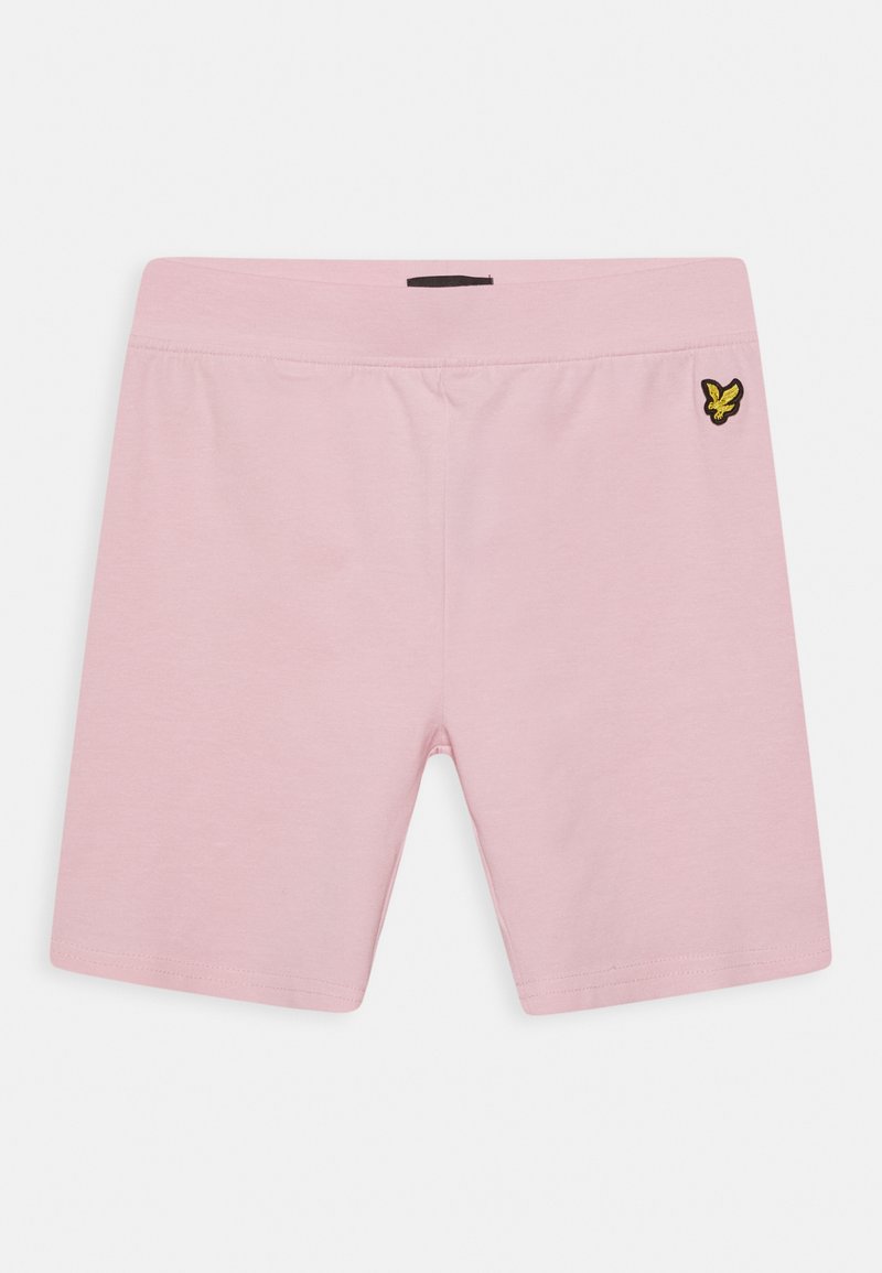 Calções cor-de-rosa claros feitos de algodão macio, apresentando uma faixa elástica na cintura e um pequeno emblema preto e amarelo no lado esquerdo.
