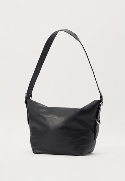 Black leather shoulder bag with a smooth texture, soft rectangular shape, adjustable strap, and subtle shine. Features silver hardware accents.