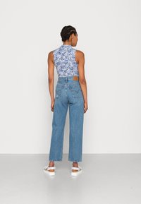 Levi's® RIBCAGE STRAIGHT ANKLE - Calças de ganga de perna direita - z0568 medium indigo destructed