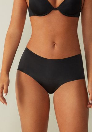 Zwarte hoge taille onderbroek van gladde, rekbare stof. Heeft een naadloos ontwerp met minimalistische randen voor comfort.
