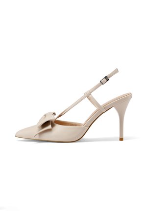 Décolleté slingback beige in pelle con punta affusolata, dettaglio a fiocco sulla parte anteriore e cinturino regolabile alla caviglia con fibbia.