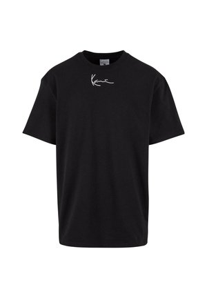 Camiseta de algodón negra con mangas cortas, cuello redondo y un logo gráfico blanco impreso en el pecho. Corte clásico y textura suave.