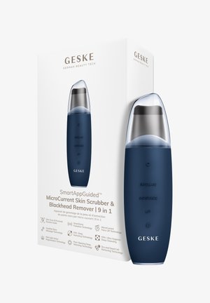 Draagbare donkerblauwe microstroom huidreiniger met doorzichtige punt, gemarkeerd met Exfoliëren, Hydrateren, Liften, naast witte productdoos met tekst en pictogrammen.