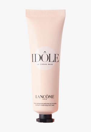 IDÔLE parfümierte feuchtigkeitsspendende Handcreme in der Tube von Lancôme, blassrosa mit schwarzem Deckel und schwarzer Schrift auf weißem Hintergrund.