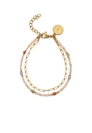 Double-strand bracelet with gold chain links and small beige beads accented by multicolored stones, featuring a gold adjustable clasp and charm.