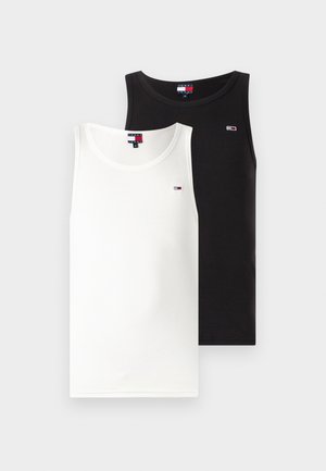 Set di due canottiere: una bianca e una nera. Ognuna presenta un collo rotondo e un piccolo logo sul petto. Realizzate in morbido cotone.