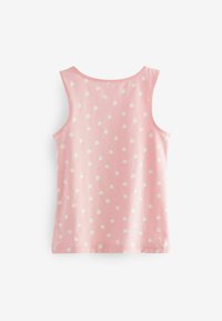 Roze tanktop met witte stippen. Gemaakt van zachte stof, heeft het een ronde halslijn en brede schouderbanden voor comfort.