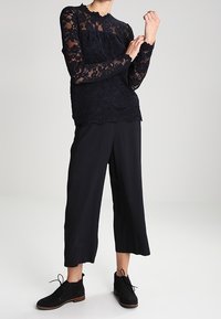 Cream Blouse - black