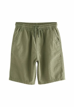 Pantaloncini casual verde oliva con vita elastica, coulisse, tasche laterali e tessuto strutturato, mostrati su sfondo bianco.