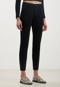 Calliope Chino - nero