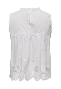 Haut sans manches blanc avec un col rond et un petit bouton à l'arrière. Présente une broderie découpée complexe le long de l'ourlet.