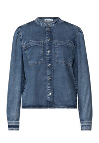 Denim long-sleeve jacket with silver snap buttons, chest pockets, and a round neckline, in a medium blue wash.