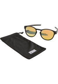 Lunettes de soleil noires avec verres jaunes réfléchissants, dotées d'un design élégant et de fines accents en métal noir. Comprend une pochette de tirage noire.