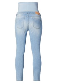 Lichtblauwe skinny jeans met een hoge tailleband, twee achterzakken en een leren label op de tailleband. Glad denim textuur.