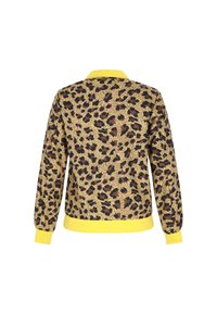 Sweatshirt i leopardmönster med gul krage och ärmslut. Texturerat tyg med avslappnad passform som visar ett djärvt, djur-inspirerat mönster.