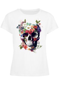 White cotton t-shirt featuring a colorful floral skull graphic, intricate detailing in various shades of pink, purple, and green.
