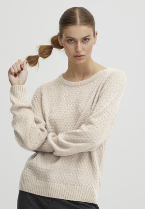 Hellbeige gestrickter Pullover mit strukturiertem Muster, weitem Rundhalsausschnitt und gerippten Bündchen und Saum. Bequemer Schnitt, weicher Stoff.