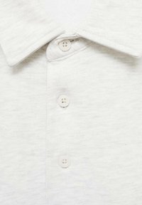 Mango Piké - mottled light grey