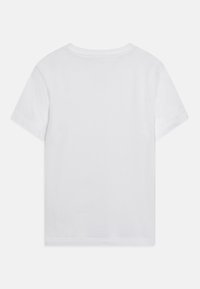 Vit kortärmad T-shirt i mjukt bomull, med rund halsringning och en enkel, odekorerad baksida utan synliga logotyper.