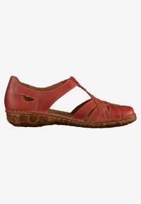 Red leather sandal with cutout design, featuring crisscross straps and a textured brown sole. Lightweight and casual style.