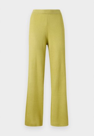 Gelbe gerippte Strickhose mit einer lockeren Passform, weitem Bein und elastischem Bund. Die Textur wirkt weich und dehnbar.