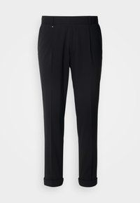 Pantaloni negri croiți, cu o textură netedă, având un front plat, pliseuri simple și manșete răsucite pentru un aspect rafinat.