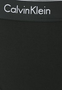 Calvin Klein Underwear THONG ICON COTTON MODAL - String - black