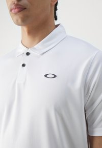 Oakley ICON PROTECT  - Pólóing - white
