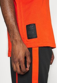 adidas Originals Triko s potiskem - black