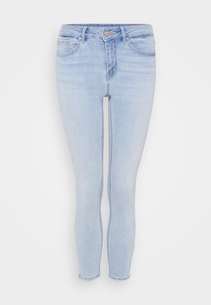 Ανοιχτό μπλε τζιν skinny παντελόνι με μεσαία μέση, πέντε τσέπες, ξεθωριασμένο φινίρισμα και αντίθεση ραφής κατά μήκος των ραφών.