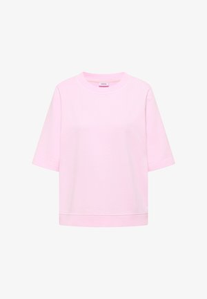 T-shirt rose clair à manches courtes avec col rond, ourlets et manches côtelés, étiqueté "CECIL" à l'intérieur du col arrière.
