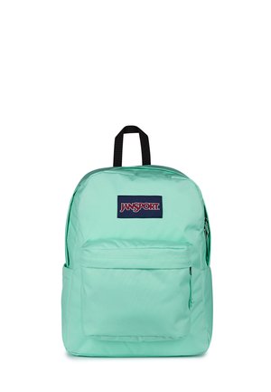 Mintgrøn JanSport rygsæk med en forflænge med lynlås, sort topgreb og JanSport logo patch på det øverste frontpanel.