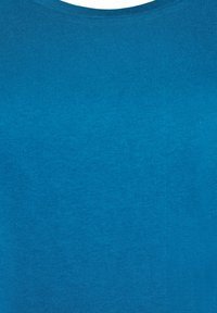 Cotton T-shirt in solid turquoise color, featuring a round neckline and a smooth, even texture without patterns or embellishments.