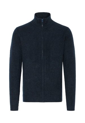 Mörkblå zip-up-tröja med hög krage, ribbade ärmslut och fåll, tillverkad av strukturerat material. Har en enkel och ren design.