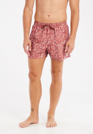 Rote Badehose mit Muster und Kordelzug, aus leichtem Stoff mit einem Blättermuster und in lockerer Passform.