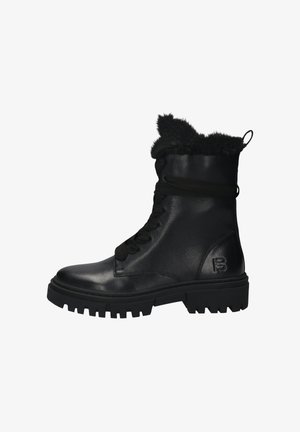Schwarze Leder-Winterstiefel mit dickem Profilsohle, Schnürverschluss an der Vorderseite, Kunstfell-Futter und Zuglasche an der Rückseite.