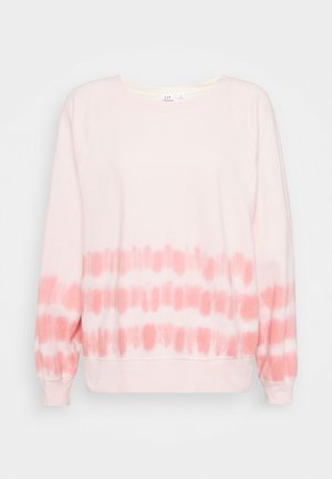 Sweatshirt tie-dye rose avec une texture douce, présentant un col rond et des manches longues ajustées. La moitié inférieure a un dégradé de rose plus clair.