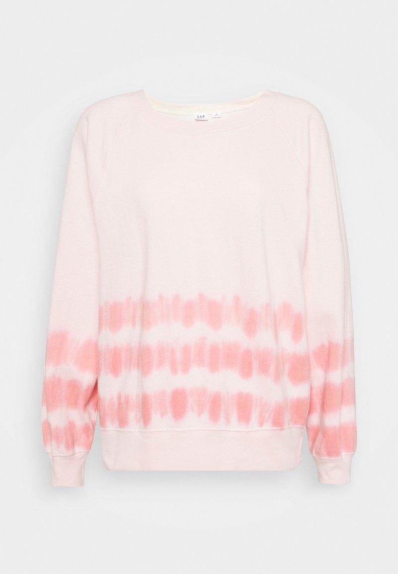 Růžová mikina s tie-dye vzorem a jemnou texturou, s kulatým výstřihem a dlouhými, těsnými rukávy. Dolní polovina má světlejší růžový gradient.