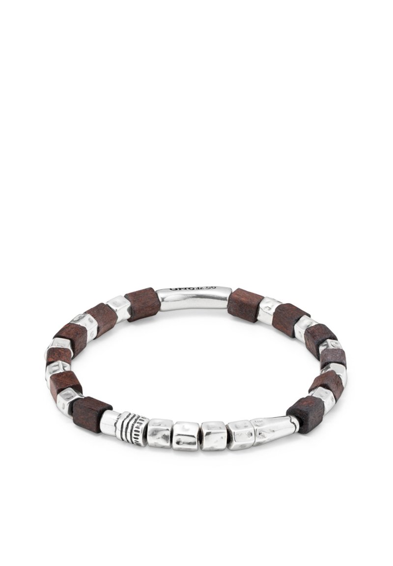 Pulsera de cuero y metal con cuentas de madera marrón, detalles metálicos hexagonales en tono plateado y un diseño suave y redondeado.