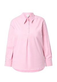 Camicia rosa chiaro a maniche lunghe con bottoni, colletto, piega frontale, orlo arrotondato e bottoni bianchi. Tessuto morbido e liscio.