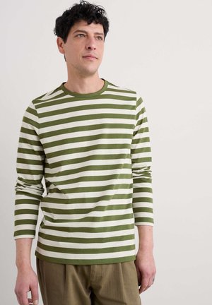 Green and white striped long-sleeve shirt with a crew neck, made of soft fabric, featuring a relaxed fit and minimalistic design.