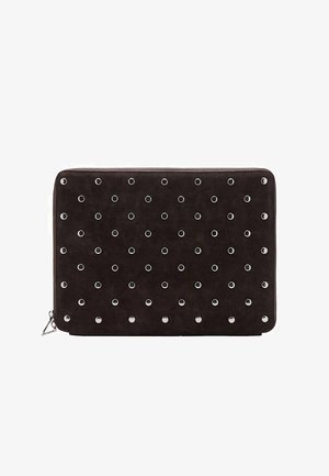 Black suede laptop case with silver circular studs arranged in a dotted pattern. Zipper closure at the side. Rectangular shape.